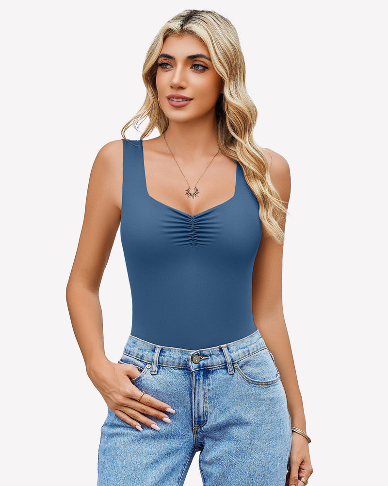 Blue sweetheart neck ruched bodysuit tank top with blue jeans. Casual wear.
