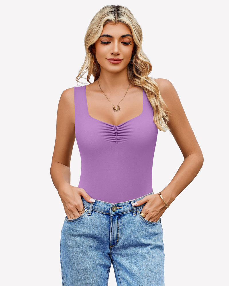 Lilac sweetheart neck ruched bodysuit tank top with blue jeans. Casual wear.