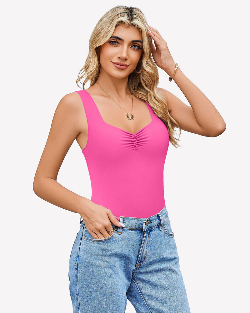 Pink sweetheart neck ruched bodysuit tank top with blue jeans. Casual wear.