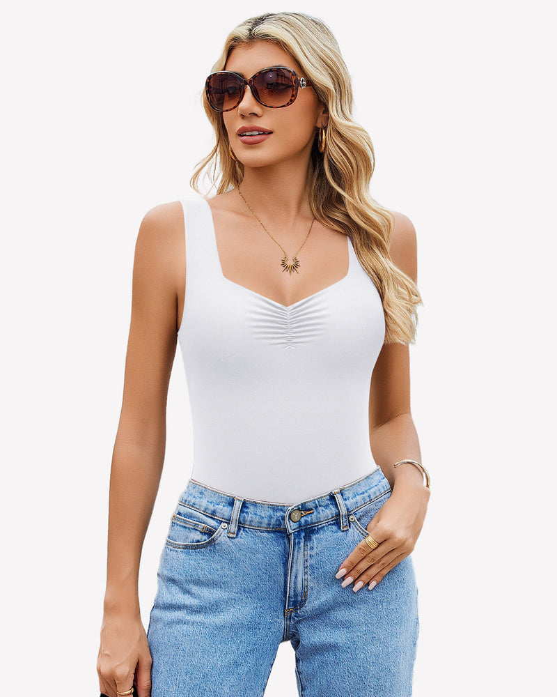 White sweetheart neck ruched bodysuit tank top with blue jeans. Casual wear.