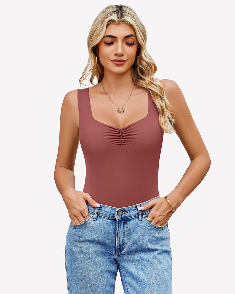 Mauve sweetheart neck ruched bodysuit tank top with blue jeans. Casual wear.