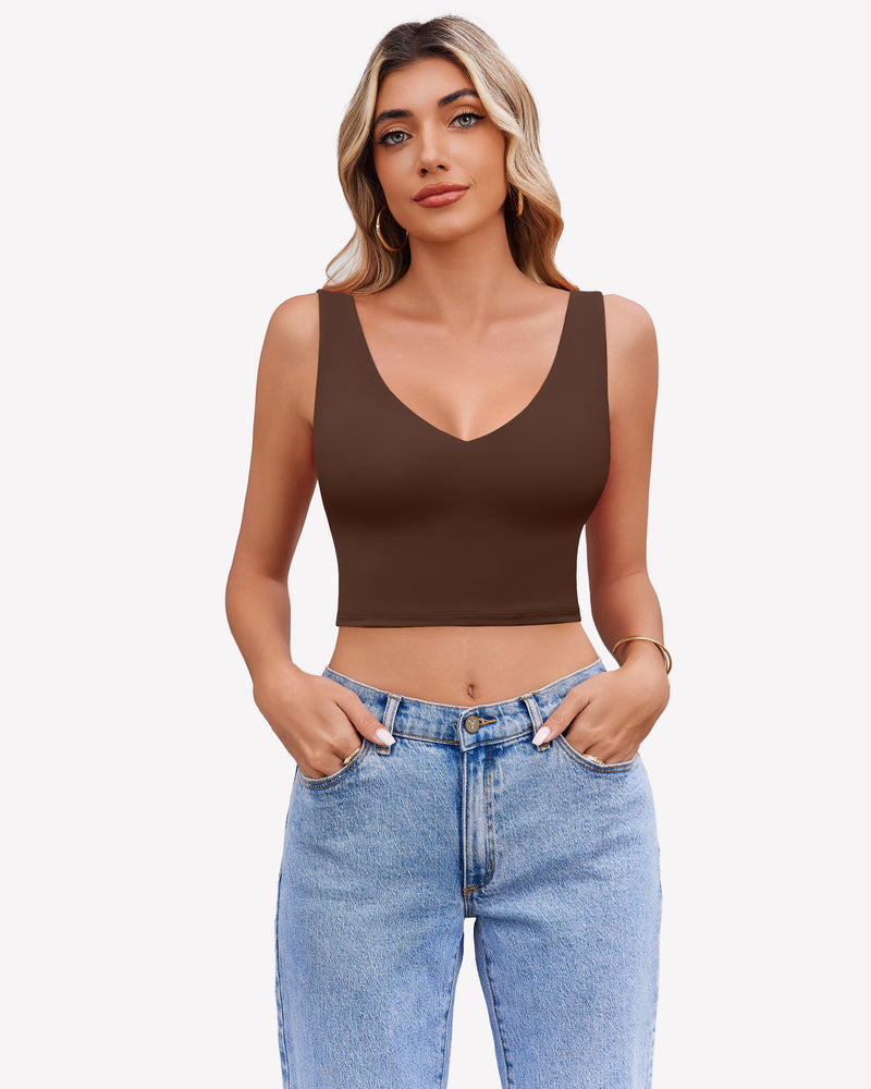 Brown crop plunge tank top camisole with V-neck and wide straps, paired with blue jeans