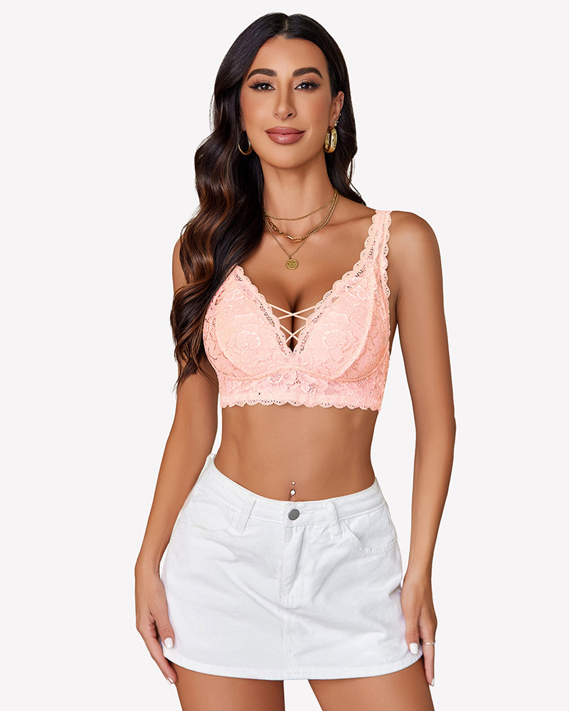 Peach lace bralette with V-neck and criss-cross design, perfect for date nights or everyday wear.