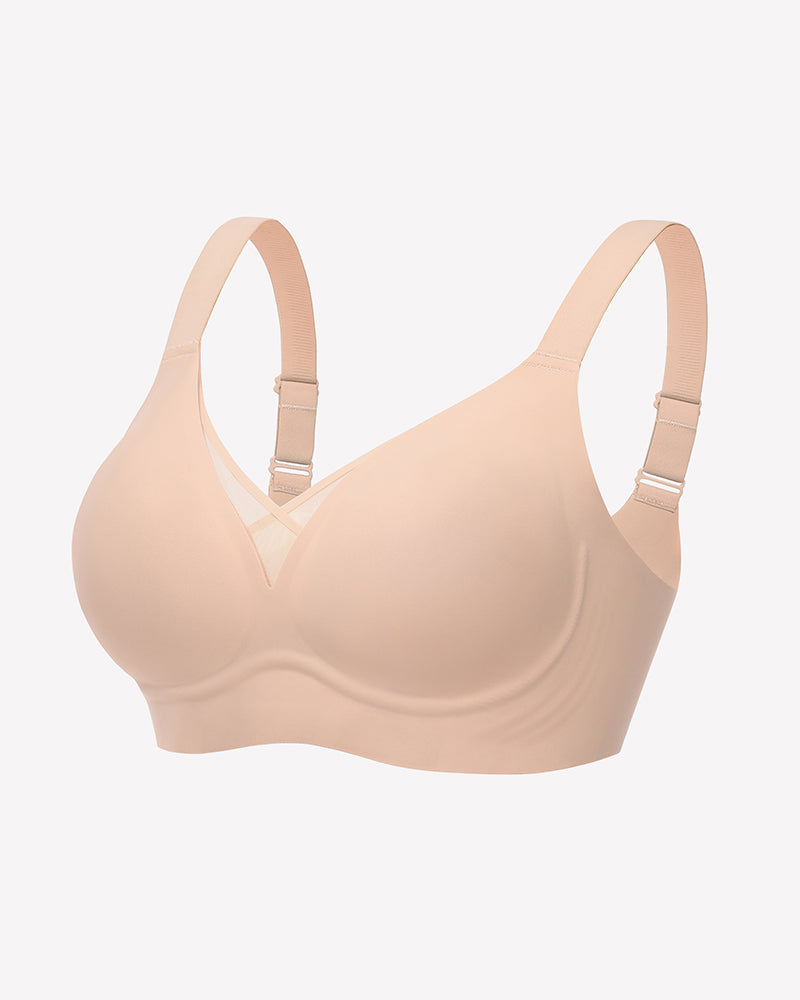 Nude seamless mesh bralette with crossover design and adjustable straps for support and comfort