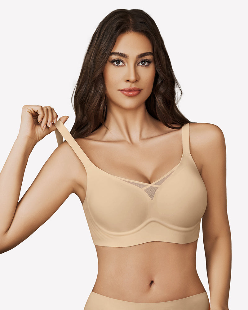 Nude seamless bralette with mesh crossover design and adjustable straps for support