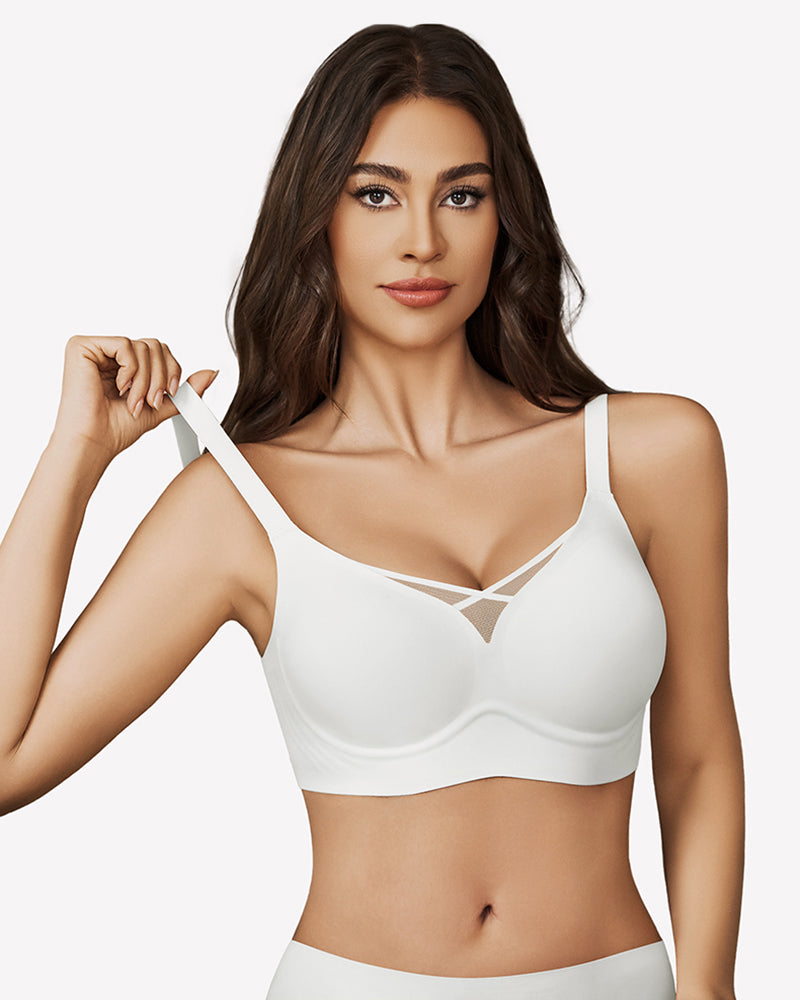 White mesh bralette with crossover design, adjustable straps, and mesh detail for support.
