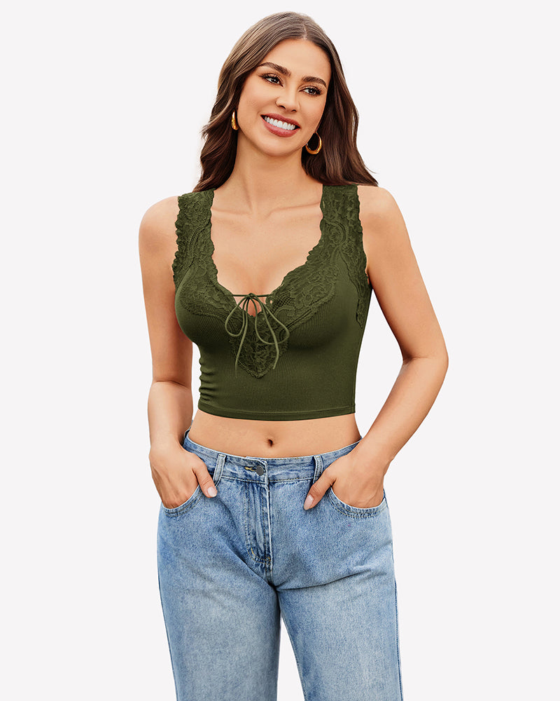 Green V-neck crop top with lace trim and tie-up front, paired with jeans. Sexy and charming style.