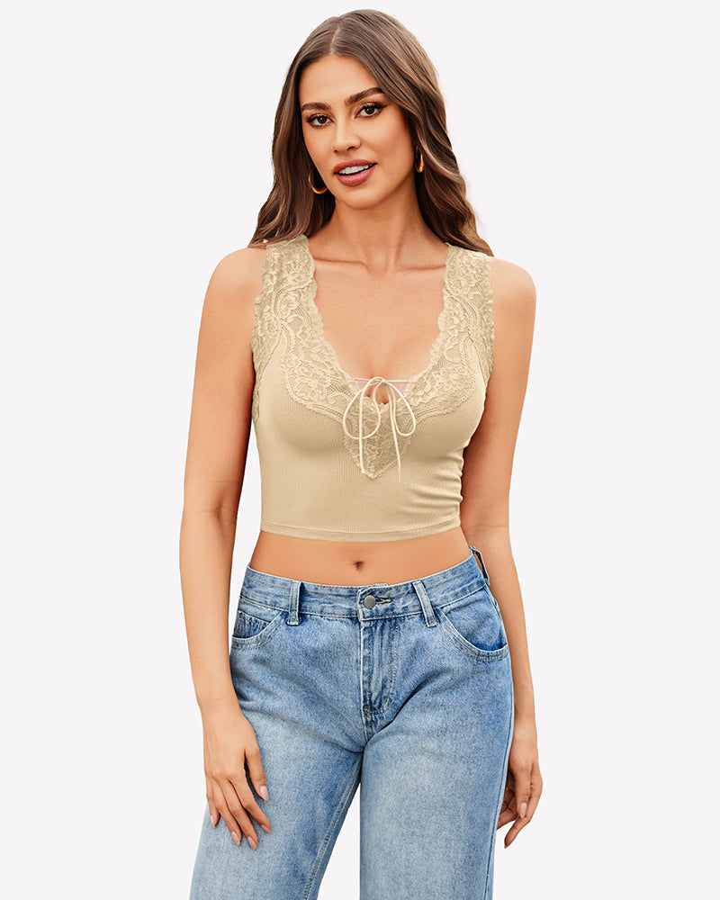 Beige V-neck crop top with lace trim and tie-up front, paired with jeans. Sexy and charming style.