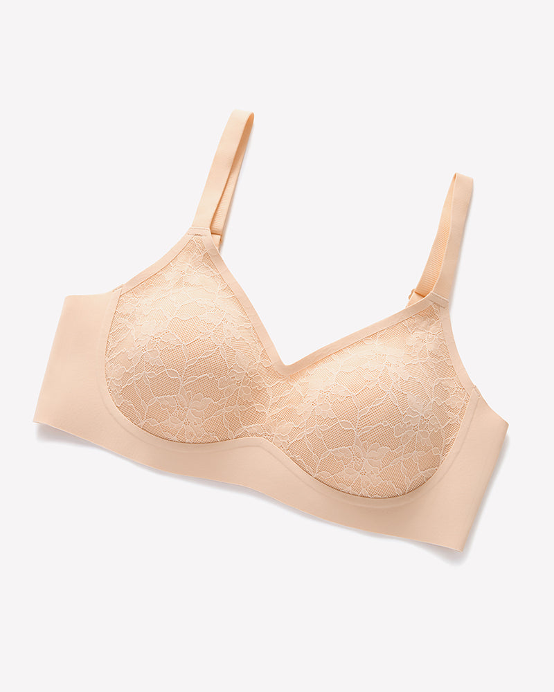 Beige lace V-neck wireless bra with adjustable straps, offering comfort and support.