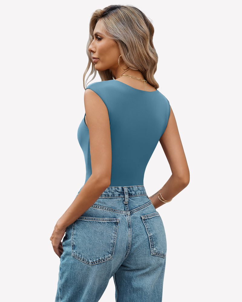 Teal seamless bodysuit with sweetheart neckline, paired with jeans. Sexy and trendy.