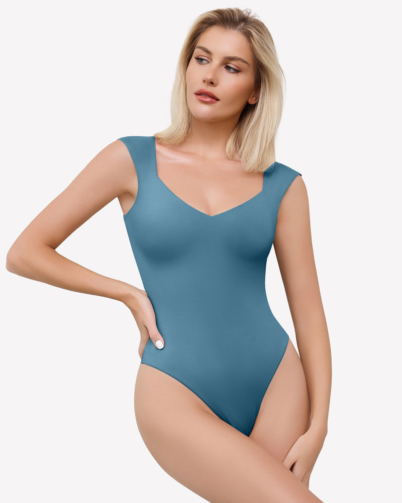 Teal seamless bodysuit with sweetheart neckline. Sexy and trendy.
