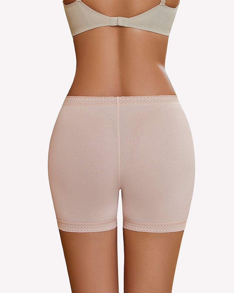 Nude seamless boyshorts with lace trim, perfect for under dresses and everyday wear.