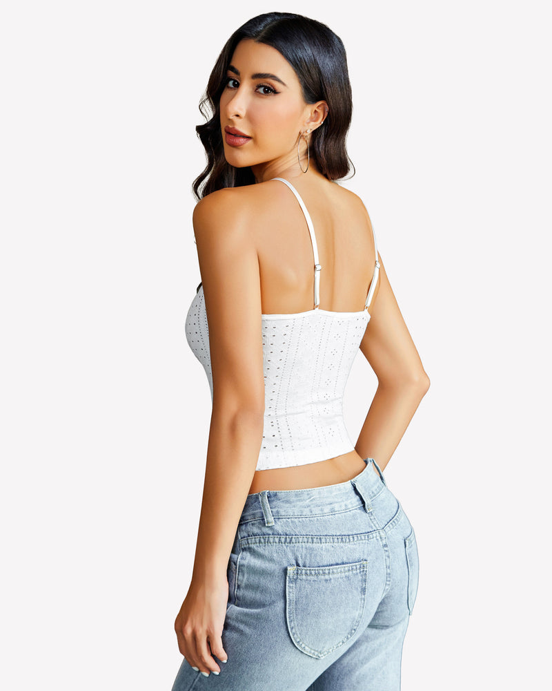 White lace trim crop top with spaghetti straps and light blue jeans, perfect summer outfit.