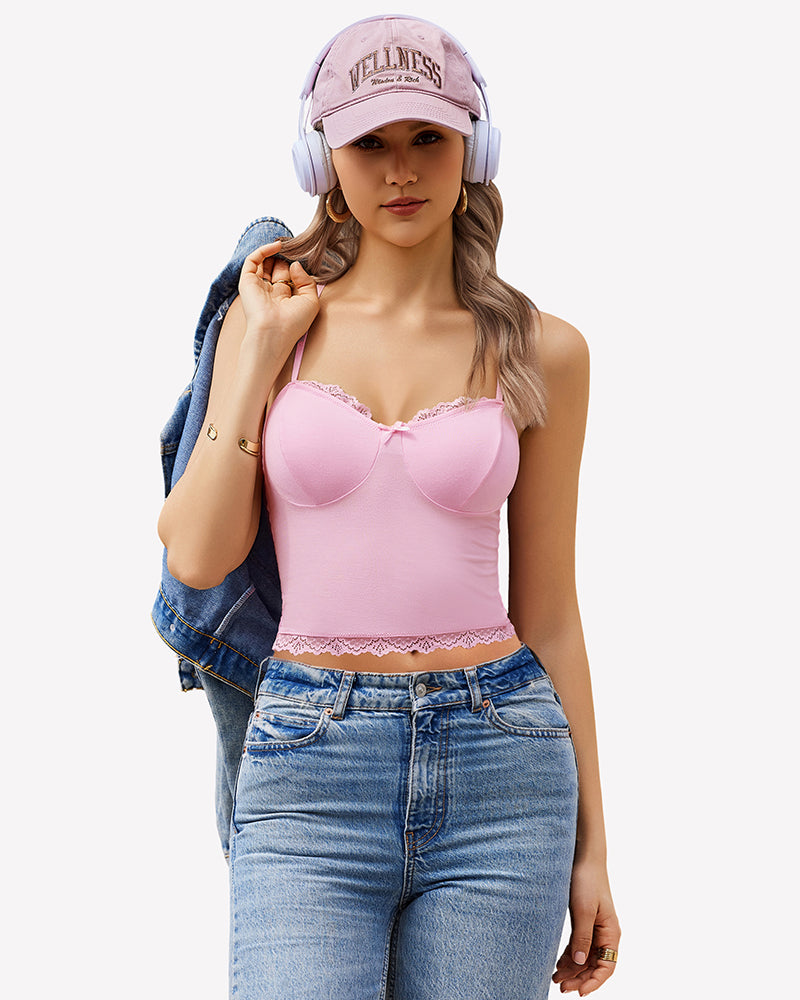 Pink lace cami Y2K top with adjustable straps, lace trim, and "Wellness" cap.