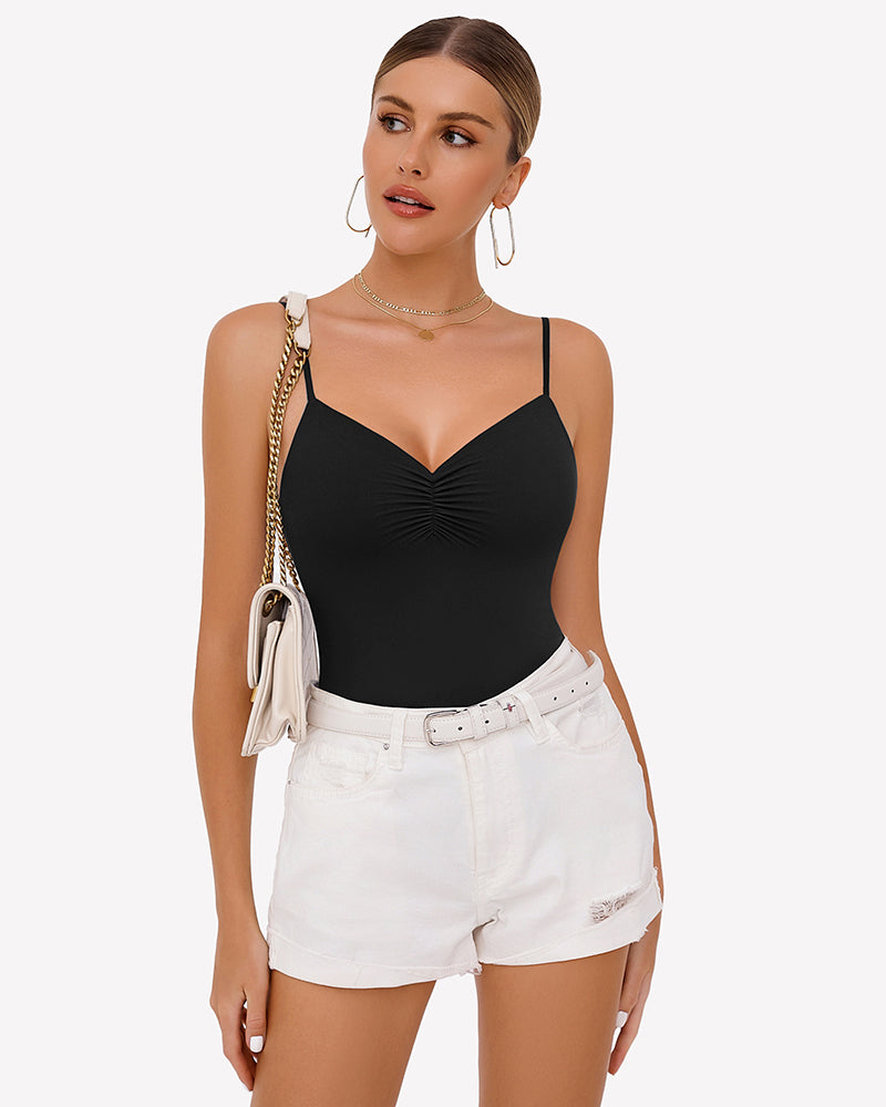 Black ruched V-neck thong bodysuit with adjustable straps. Paired with white shorts. Sexy lingerie.