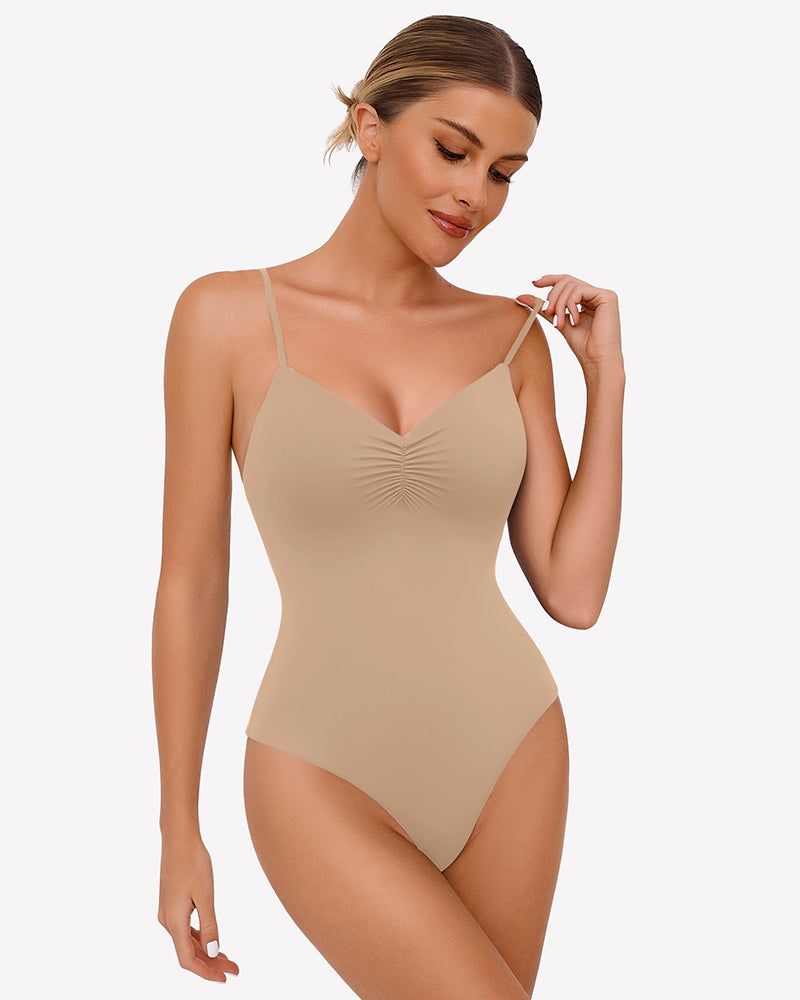 Beige ruched V-neck bodysuit with adjustable straps. Perfect for everyday wear or special occasions.