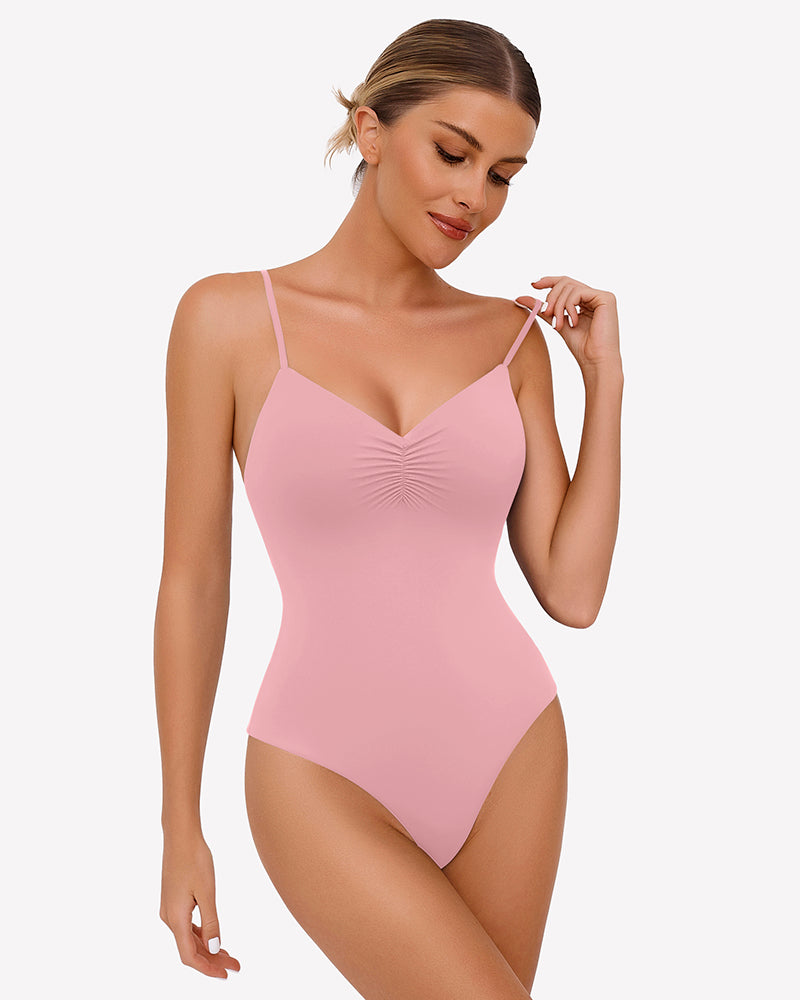 Light pink ruched V-neck thong bodysuit with adjustable straps. Sexy lingerie.