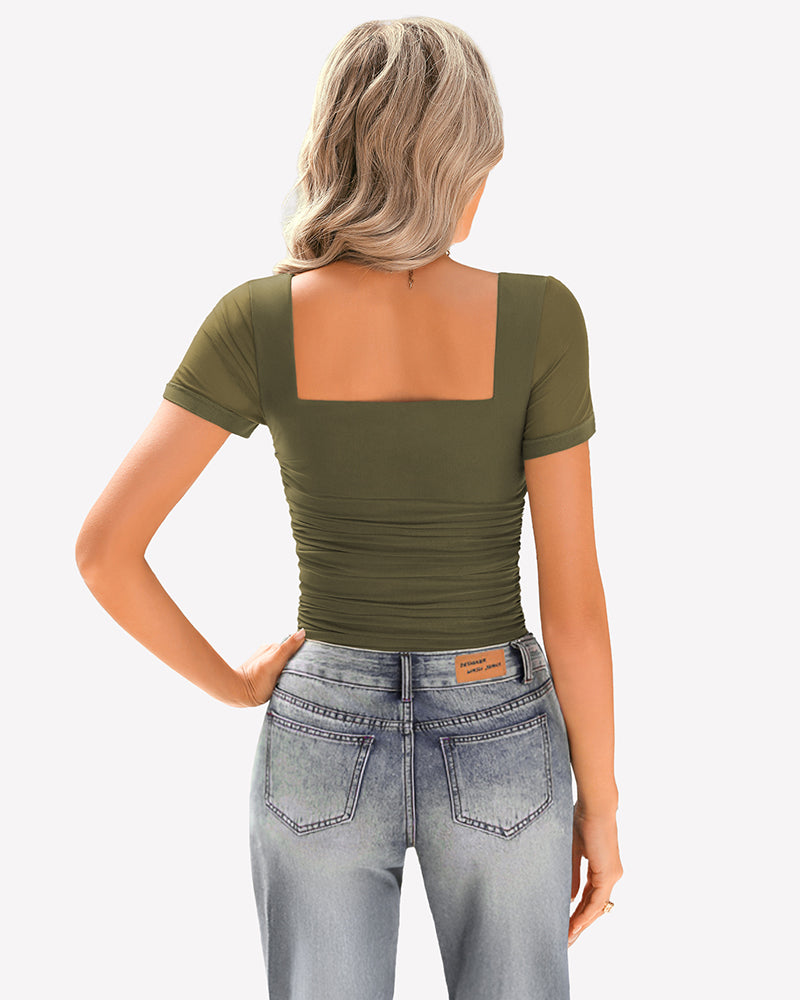 Olive green sheer mesh ruched top with square neck and jeans. Soft, breathable fabric.