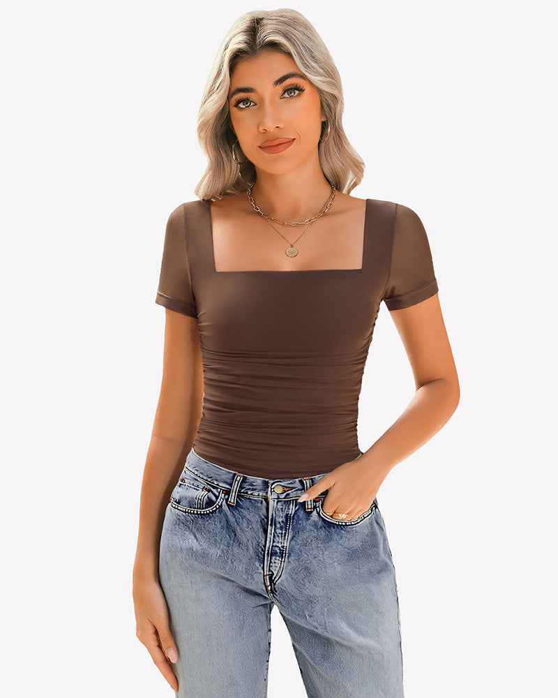 Sheer mesh ruched top with square neck in brown, paired with jeans. Soft, breathable fabric.