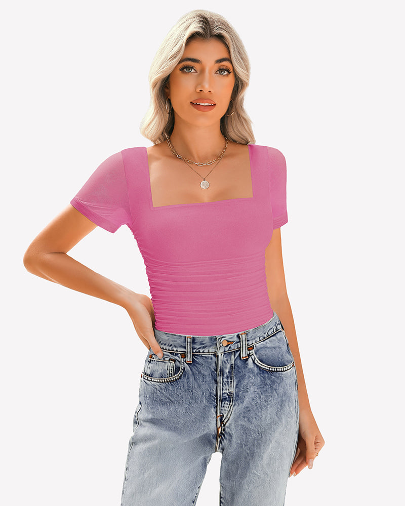 Pink sheer mesh short sleeve ruched top with square neck and jeans. Soft, breathable fabric.
