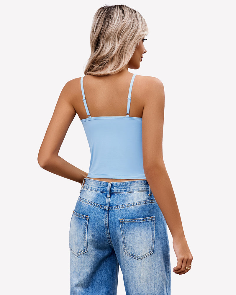 Light blue spaghetti strap crop top with jeans. Summer tank top for women, comfortable and stylish.