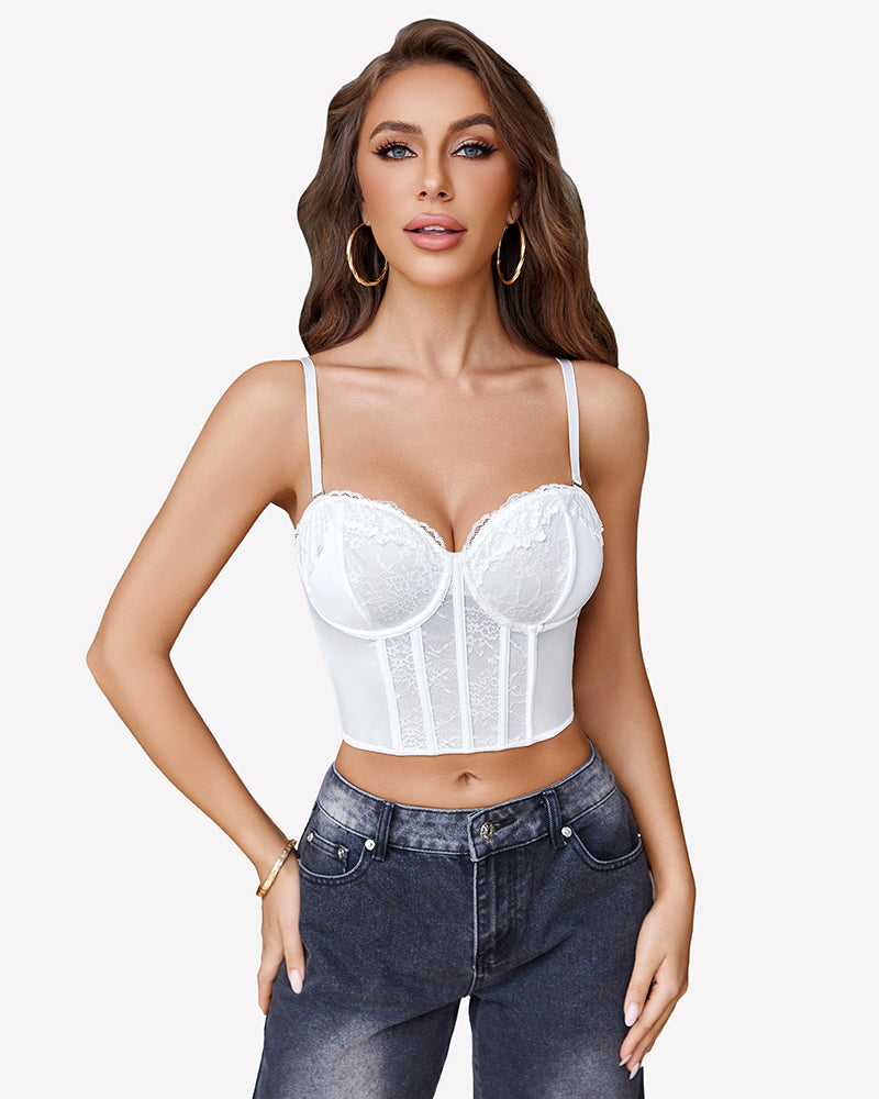 White lace bustier top with spaghetti straps and V-neck, paired with dark-wash jeans