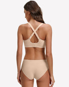 Nude padded bralette with wide crossover back straps