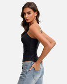 Black one-shoulder ruched tank top in side view with ruched waistline