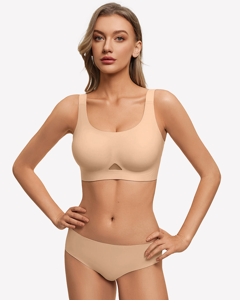 Nude seamless padded U-neck wireless bra on model, adjustable straps