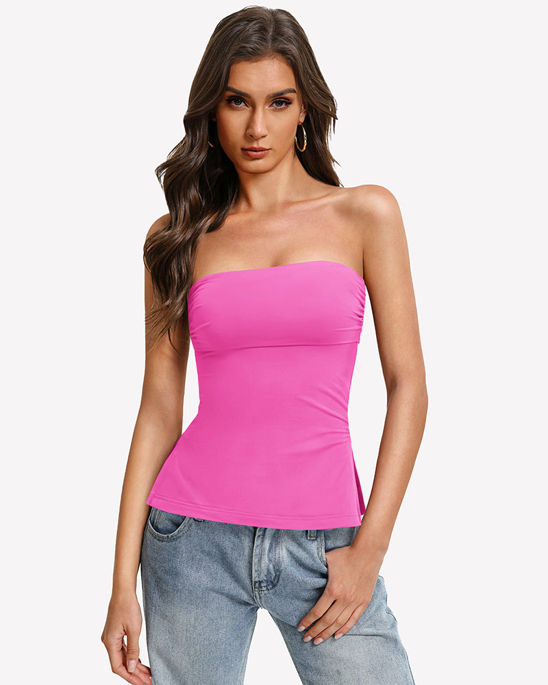Double-lined strapless tube top in bright pink with ruched bust, side-slit hem