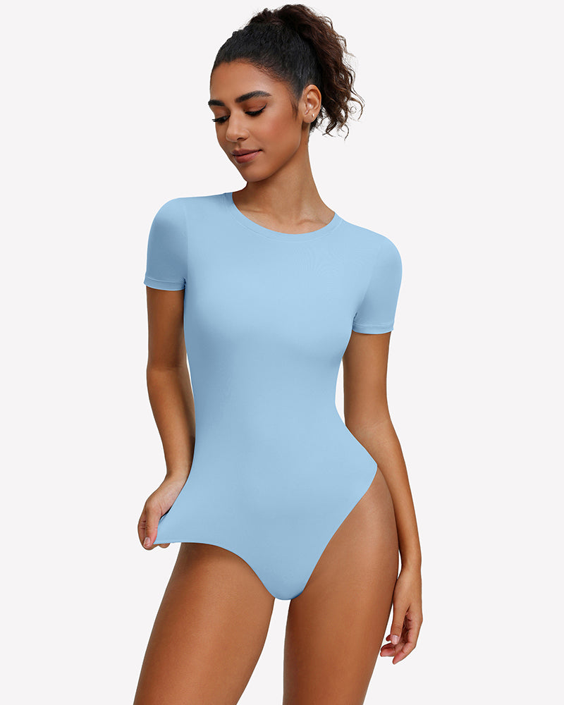 Light blue short sleeve snap bodysuit one-piece leotard, side view