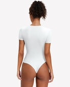 White short sleeve snap bodysuit one-piece leotard, back view