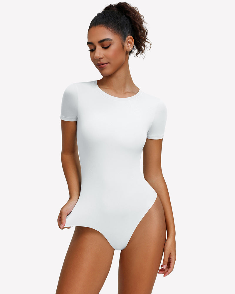 White short-sleeve snap bodysuit, fitted one-piece leotard top.