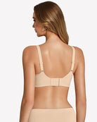 Wireless seamless bralette back view in light beige, adjustable straps and center closure