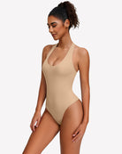 Beige halter bodysuit with deep scoop neckline, seamless one-piece