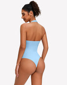 Light blue backless halter bodysuit with high-cut sides