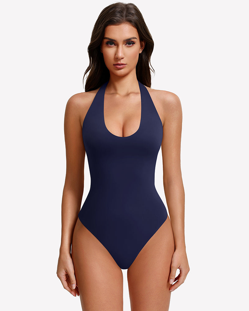 Navy blue halter bodysuit with deep scoop front and backless open back