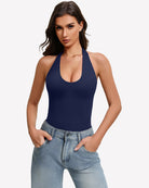 Navy blue backless halter bodysuit with deep scoop neckline and high-cut legs