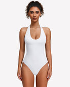 White halter bodysuit with deep scoop neckline and high-cut legs