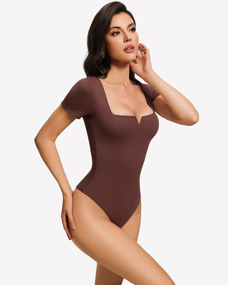 Brown square-neck short-sleeve bodysuit, fitted one-piece with deep neckline and snaps