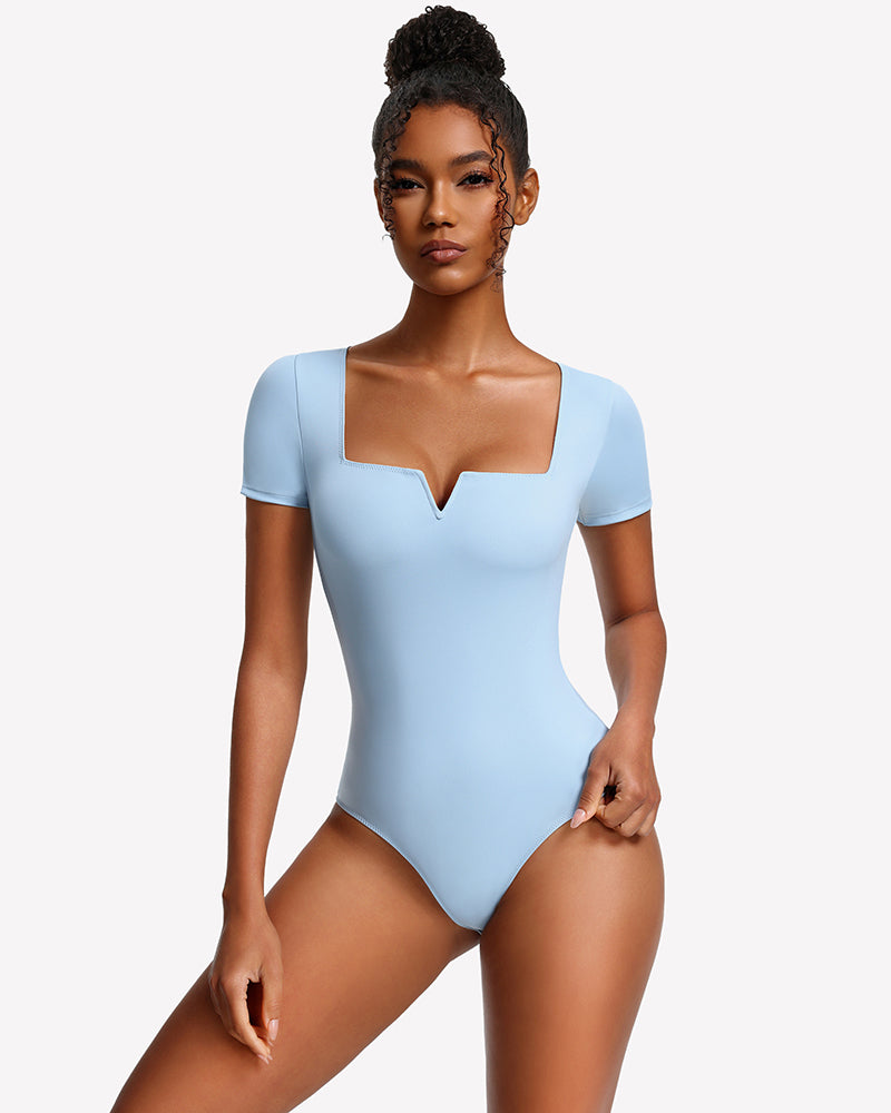Light blue square-neck short-sleeve bodysuit with fitted one-piece silhouette