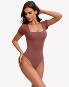 Brown short-sleeve square-neck bodysuit with fitted one-piece silhouette
