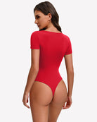 Square-neck short-sleeve bodysuit in red, back view with high-cut coverage
