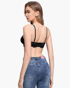 Black lace balconette underwire bra viewed from back with adjustable straps