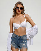 Balconette lace bra in white with sheer lace cups, scalloped edges, thin straps