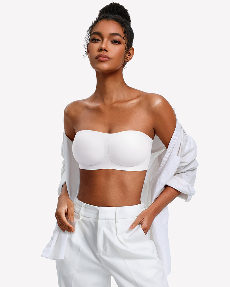 Strapless wireless bra in white with smooth molded cups, worn under an open shirt