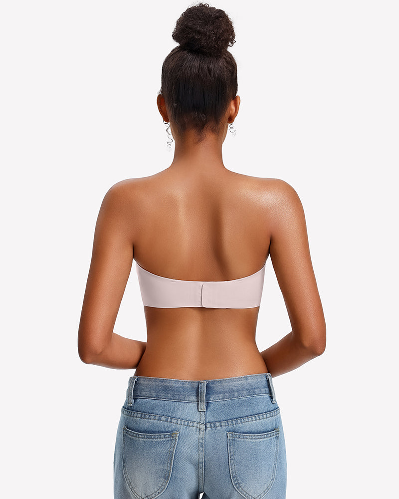 Back view of a strapless wireless bra in white with a center back seam