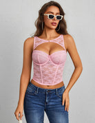 Pink lace halter corset top with underwire cups and sweetheart neckline.