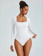 White lace-trim square-neck long-sleeve bodysuit, double-lined fitted stretch knit.
