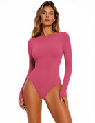 Double-lined boat-neck long-sleeve bodysuit, bright pink, seamless, thong-style bottom.